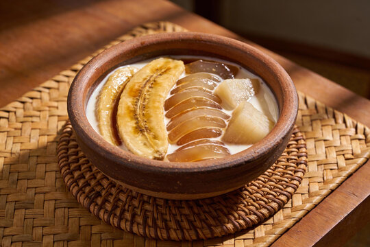 Traditional Indonesian Food Kolak Pisang with Kolang Kaling and Sweet Potato in Coconut Milk for Ramadan Iftar