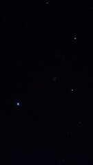 Bright stars twinkle dark night sky, creating serene and captivating celestial scene. vastness of space is filled with distant stars