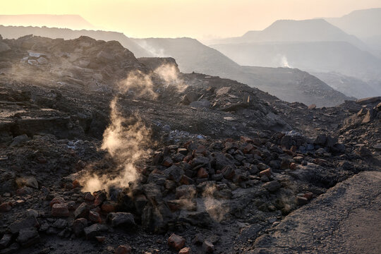 Underground coal fire in rocky landscape