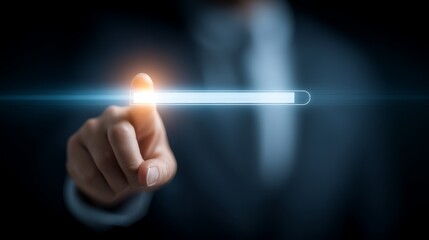 A businessman in a suit points at a glowing digital interface. The background is dark, emphasizing the light from the interface.