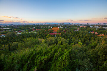 Obraz premium Overlooking the central axis and forest of architectural complexes in Jingshan Park, Beijing, China