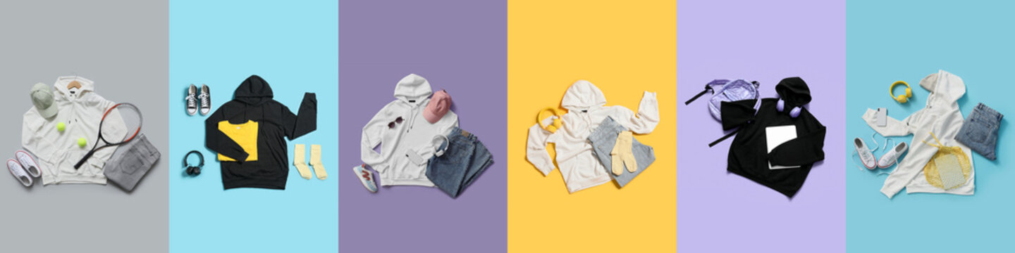 Set of stylish hoodies with modern accessories on color background