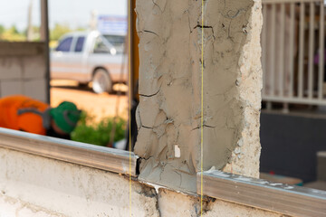 Obraz premium Construction crack inspection building site urban environment close-up view structural integrity