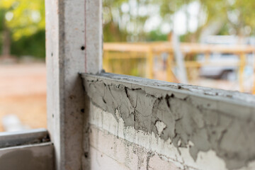 Construction progress at local site urban environment daylight close-up building techniques