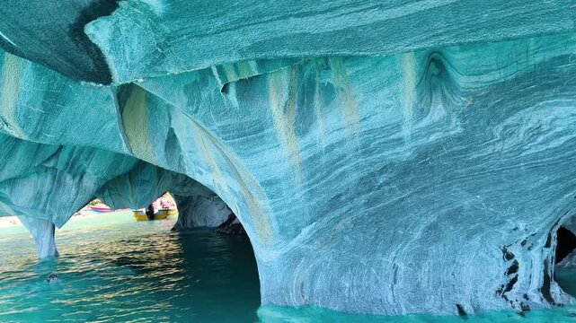 Cinematic boat tour inside the Marble Caves, General Carrera Lake, Chile.