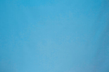 Abstract blue background texture with subtle gradient and soft focus.