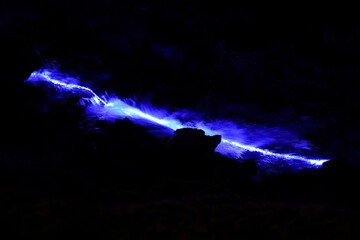 Illuminated mountain stream in winter, Korytnica, Slovakia.