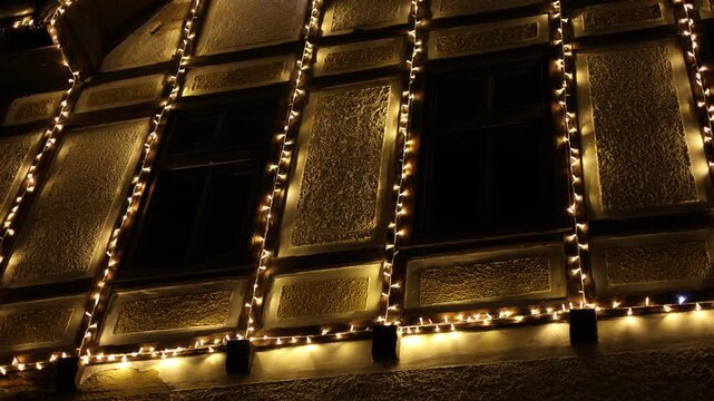 Old house illuminated with Christmas twinkling lights, former Korytnica spa, Slovakia.