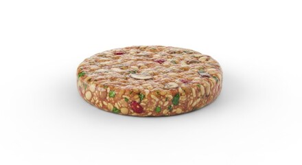 A round, brown granola bar with nuts and seeds, placed on a white surface with a shadow cast on the ground.