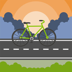 Naklejka premium Bicycle on road landscape at sunset for green mobility concept