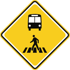 Road sign silhouette warning of bus and pedestrian crossing