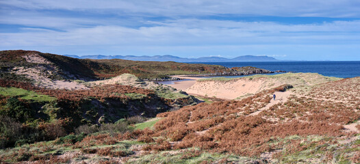 Obraz premium The beach through windblown sand dunes at Red Point. By Gairloch and Poolewe. Scotland UK