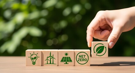Hand Placing Leaf Symbol Block on Net Zero Goal with Eco Icons