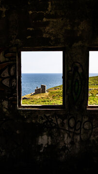 Abandoned building window with sea views
