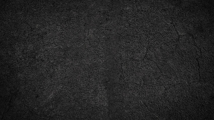 Fototapeta premium Dark and Textured Dry Earth Surface with Cracks and Crevices