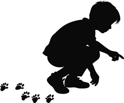 Boy Crouching To Look At Animal Tracks Silhouette