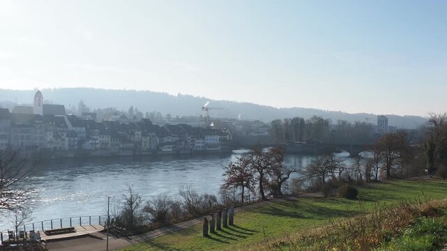 Rheinfelden (Aargau) in Switzerland, downstream from the old bridge over the Rhine, seen from the meadow on the Adelberg hill  and Weinbergstrasse on the German bank
