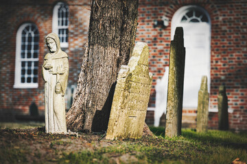 Statue Among Graves