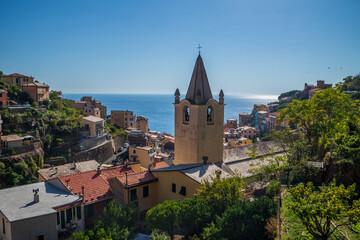 Fototapeta premium Coastal village Riomaggiore famous fisherman village on steep cinque terre coast Italy
