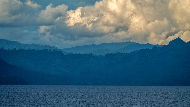 Exotic islands in the equatorial seas, Bali Sea, Gamalama stratovolcano island. Indonesia. Indian Ocean. Ternate, archipelago Moluccas, Spice Islands