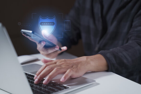 Close-up of a man using a mobile phone for secure login and account protection
