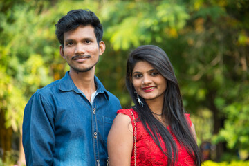 Obraz premium Portrait of happy brother and sister at outdoor