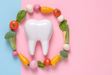 Healthy tooth surrounded by fresh vegetables on pastel pink and blue background, symbolizing dental care and nutrition for strong teeth and bright smile