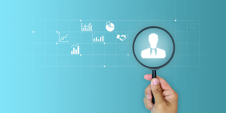HR management dashboard with business growth graphs and performance statistics. Professional talent analysis concepts. Hand holding magnifying glass over human resource icon for data analytics.