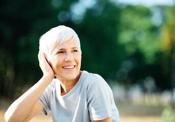 Obraz premium Beauty portrait of a sensual senior elderly woman, skin care and fashion concept. Aesthetic cosmetology and dermatology, face care and facial treatment, vitality, active healthy senior fitness sport c