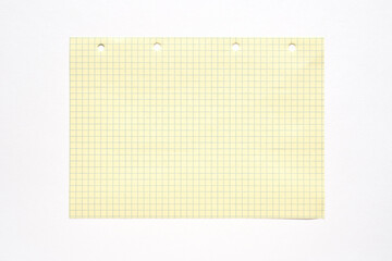 Yellow graph paper with blue grid on white background for mathematics or design projects.