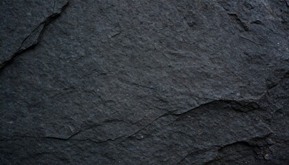 Close-up Texture of Dark Slate Rock Surface with Natural Layers.
