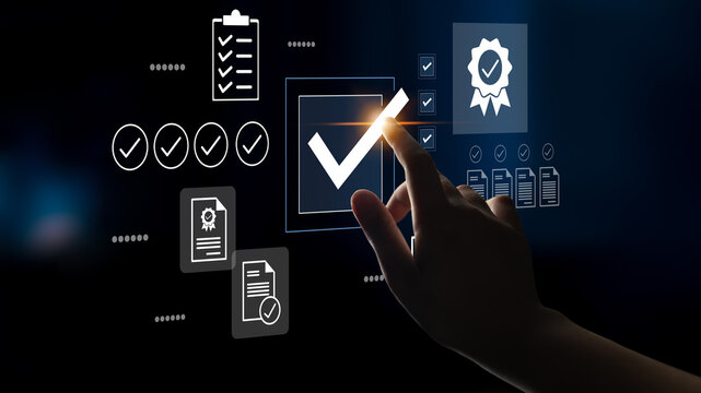 A hand interacts with a digital checkmark on a touchscreen, symbolizing approval and certification in a modern technological setting. Perfect for business or tech themes. Gantry