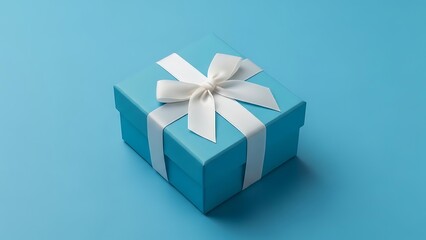 Obraz premium Blue gift box with white ribbon bow on blue box wrapped present
