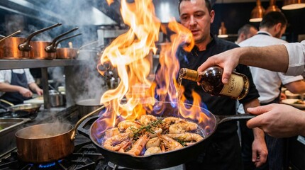 Chef flamb&eacute;ing shrimp in a pan with flames in restaurant kitchen  