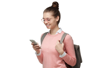 Plakat Happy young female student using smartphone with backpack, looking down