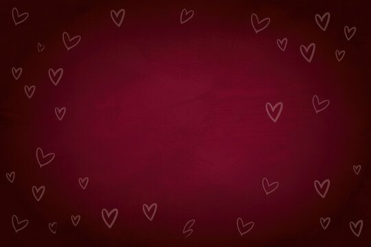 Hand-drawn hearts on dark red textured background in soft lighting for Valentines Day design