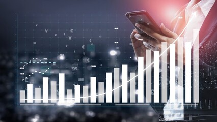 A business professional uses a smartphone to analyze financial data, featuring a bar graph and growth trend, representing modern finance technology in an office setting. Copula