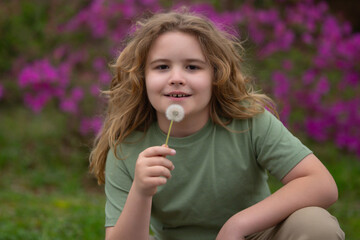 Obraz premium Child carefree outdoor. Dreamy summer nature with carefree kid. Teenager happiness joy on nature. Kid carefree. Child carefree on meadow garden.