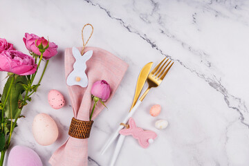 Elegant Easter Table Composition with Roses and Cutlery