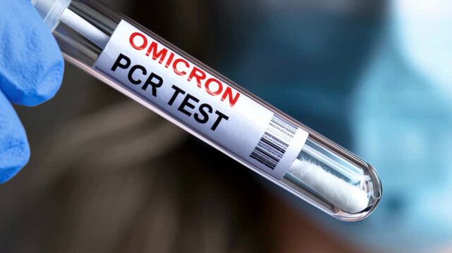 COVID-19 test in doctor hand, tube of omicron corona virus PCR testing close-up against blurred nurse face