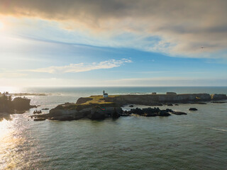 Fototapeta premium Cape Arago Lighthouse near Coos Bay Oregon Coast, drone photo. 