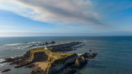 Naklejka premium Cape Arago Lighthouse near Coos Bay Oregon Coast, drone photo. 