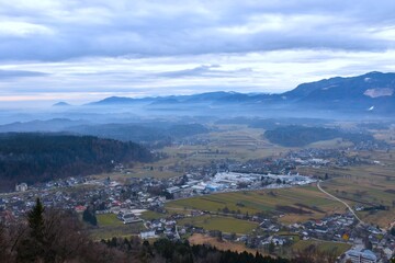 Fototapeta premium View of Begunje village in Gorenjska, Slovenia with Jelovica plateau in the distance