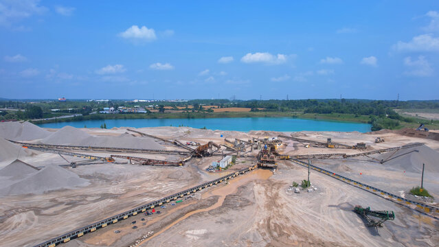 Canadian landscape of rare earth mining site. Critical rare earth minerals used for technology, weapon and electric vehicles. Concept of industry, nature, and environmental impact.