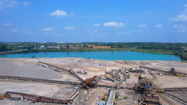 Canadian landscape of rare earth mining site. Critical rare earth minerals used for technology, weapon and electric vehicles. Concept of industry, nature, and environmental impact.