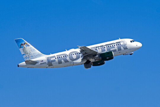 sky harbor airport 9-11-2005 Phoenix, AZ USAFrontier Airlines Airbus A319 N925FR departure from runway 8 at Phoenix Sky Harbor Intl. Airport.