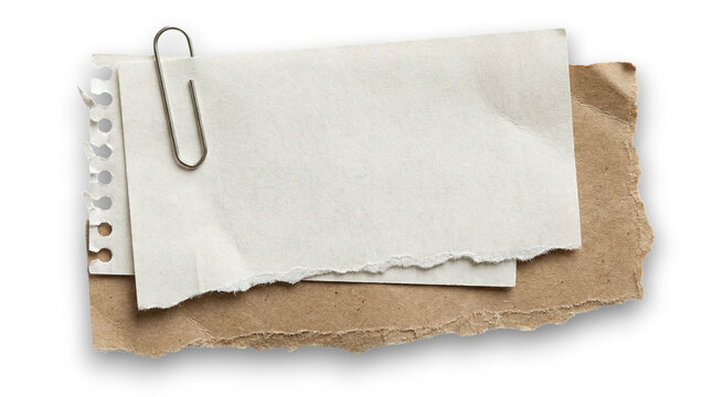 Layered torn paper sheets with metal paperclip isolated on transparent background