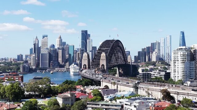 Zoom out from Sydney Harbour bridge arch entrance from Bradfield highway in Sydney.