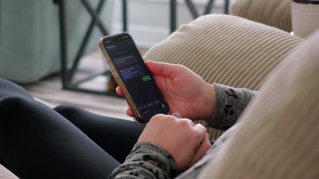 Woman Receives Suspicious SMS Text Message Stating Past Due State Toll Road Fees Looks Like Common Cyber Scam Focused on Urgent Legal Action Concept