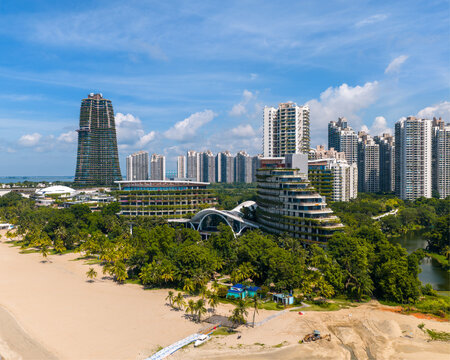 Aerial panoramic view of Forest City in Johor, Malaysia with a blue sky and clouds as background.